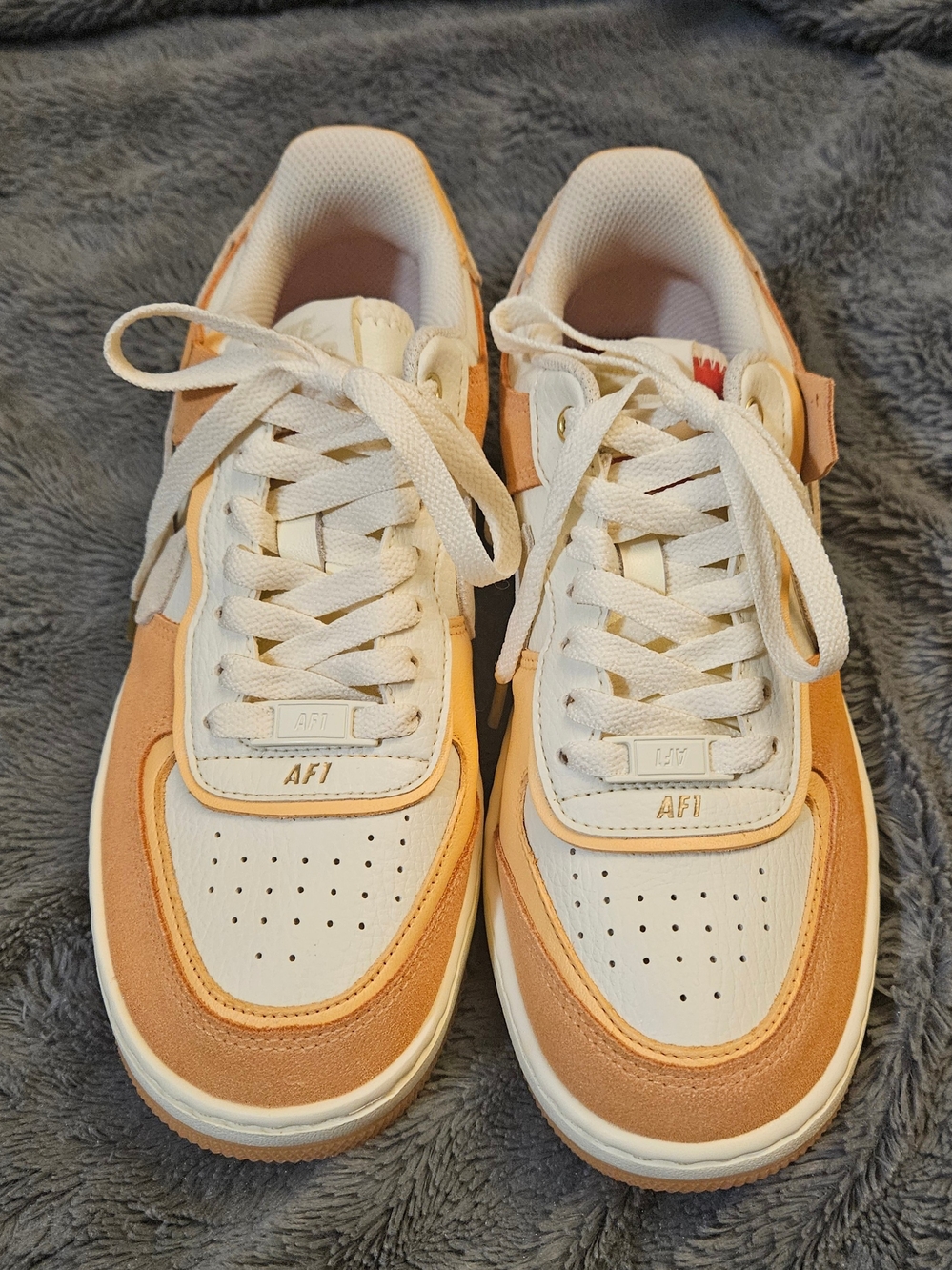 Nike Women's Low-Top Sneakers in White and Peach